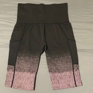 Black and pink biker shorts with pockets
